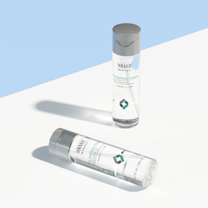 An image of two battles of SUZANOBAGI MD Balancing Toner, one is standing and the other lying horizontaly on the surface.